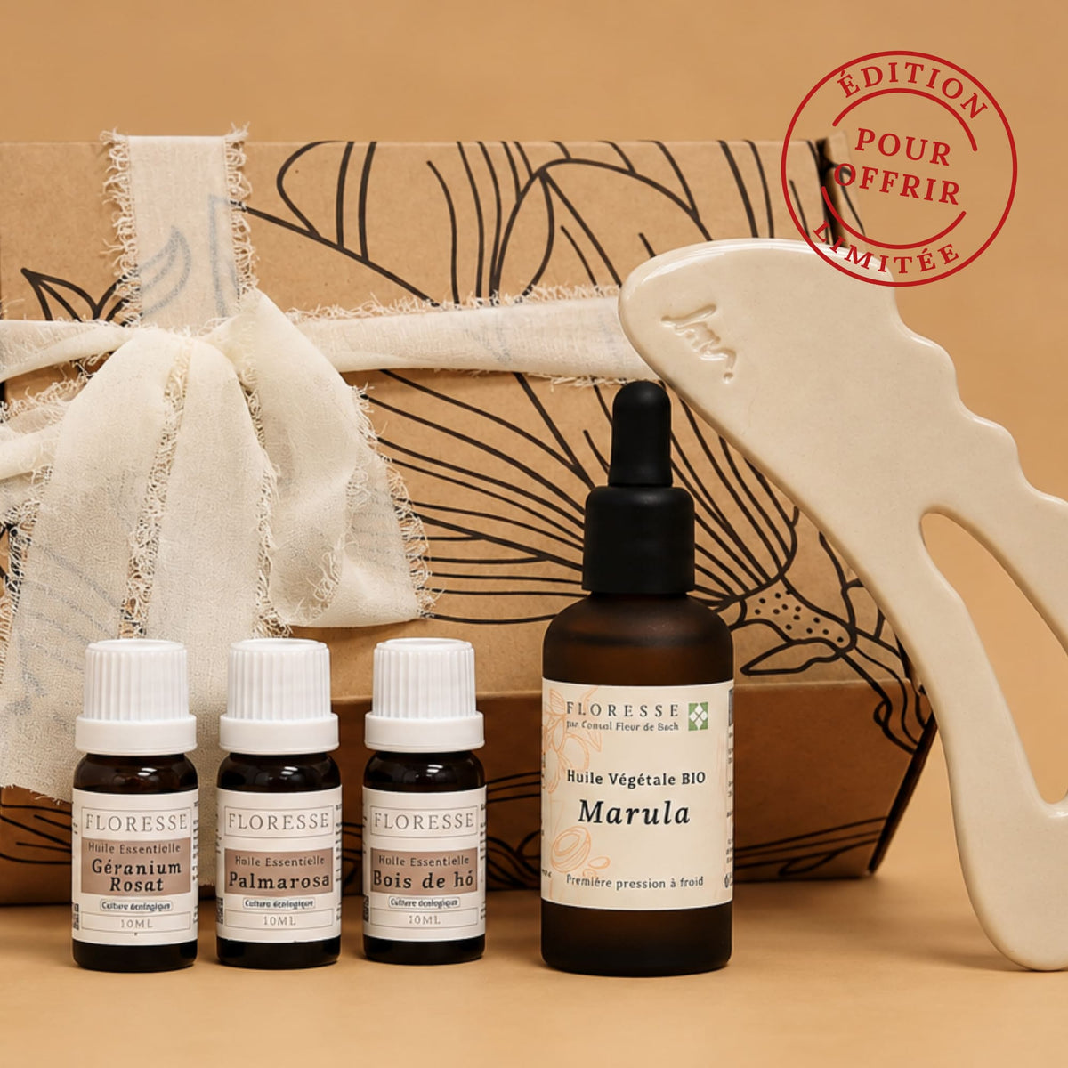 Coffret cadeau massage corps comprenant huile végétale, trois huiles essentielles et Gua Sha céramique.