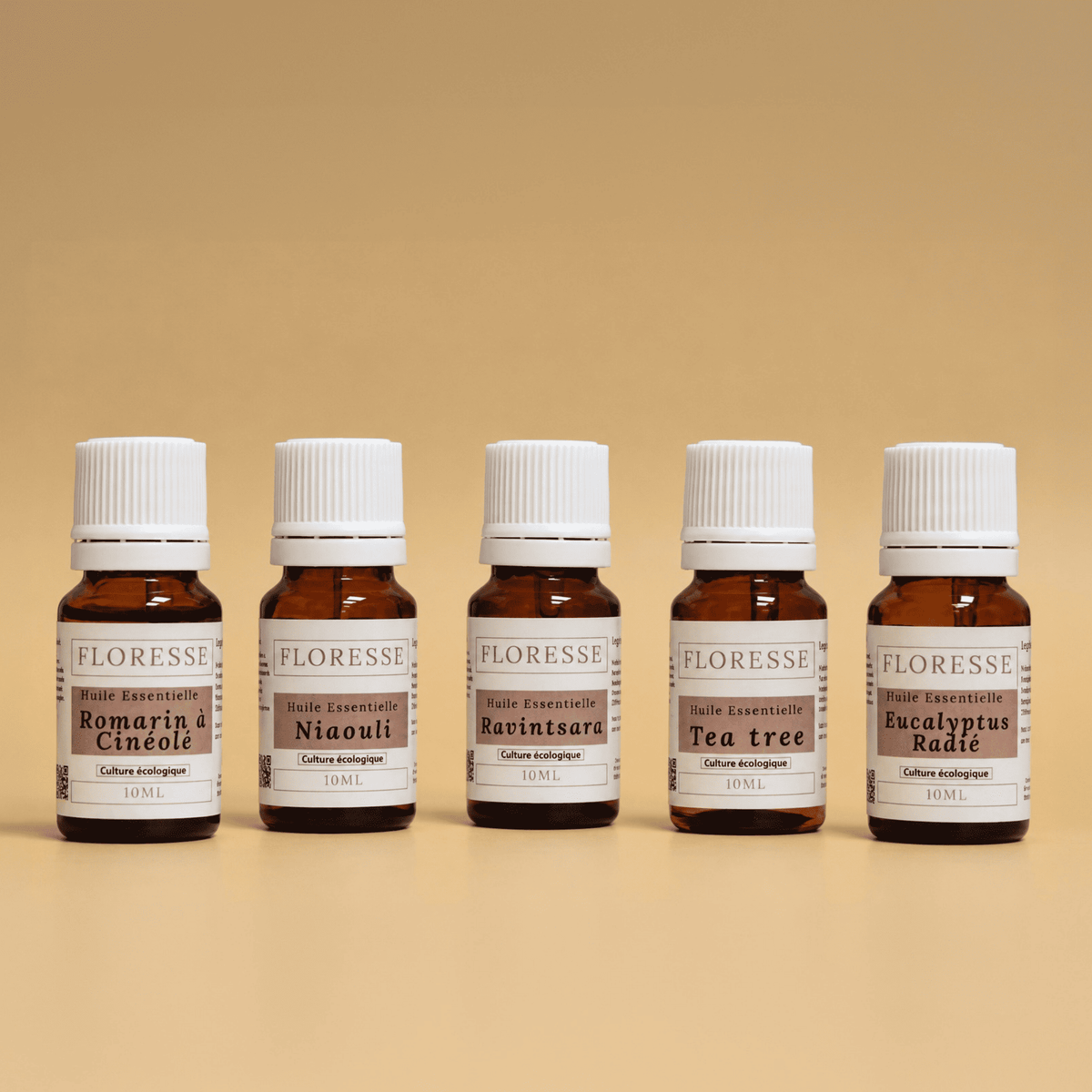 Les 5 huiles essentielles indispensables de l'hiver : ravintsara, tea tree, eucalyptus radié, niaouli et romarin en flacons 10ml.