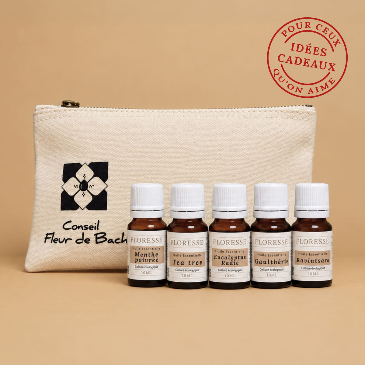 Trousse nomade en coton biologique avec le lot des 5 huiles essentielles indispensables du quotidien.